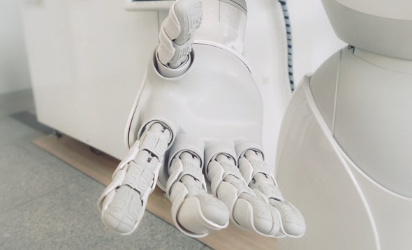 Close up of a white robotic hand